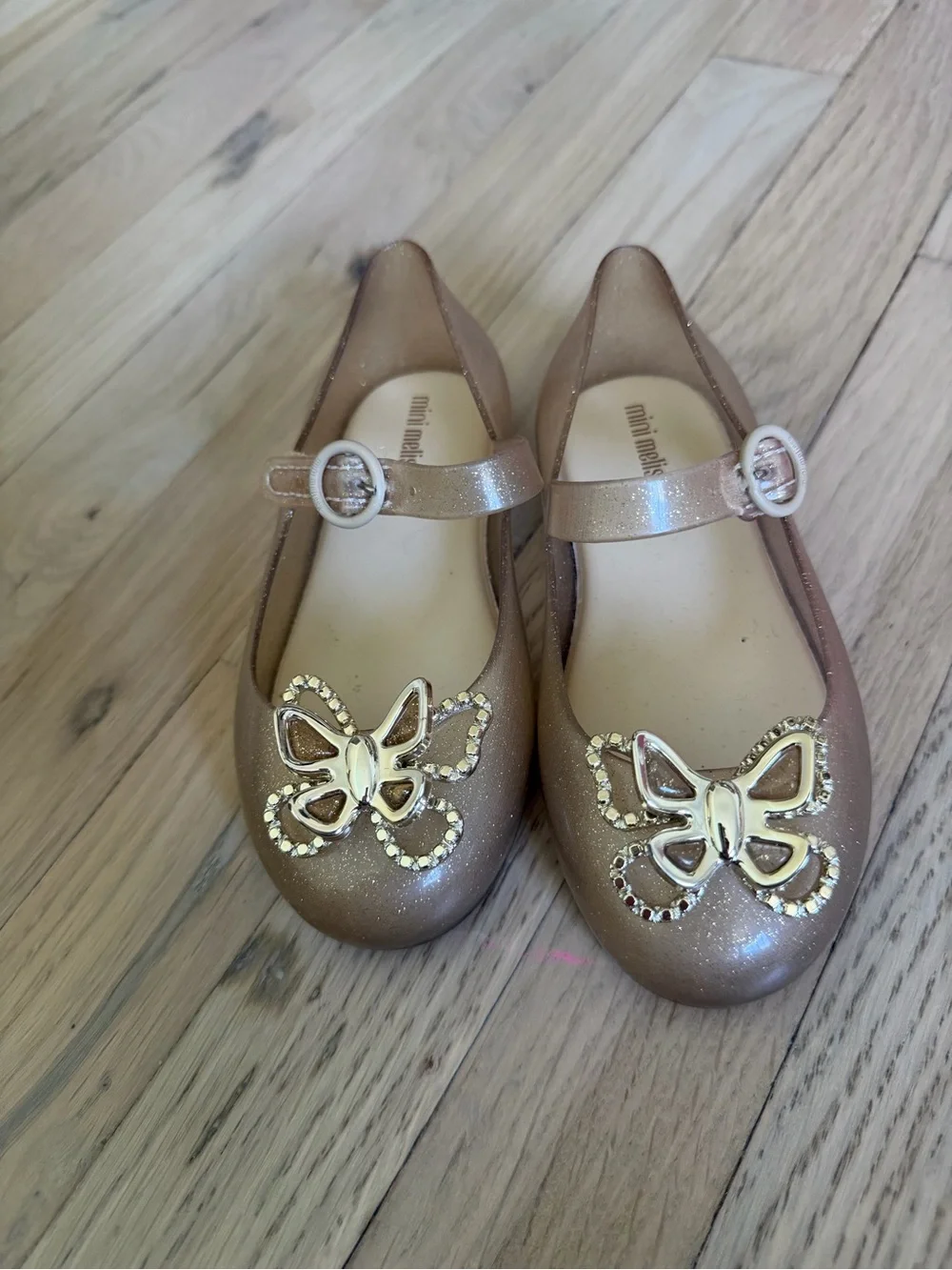 Mini Melissa gold Maryjane butterfly detail size 10